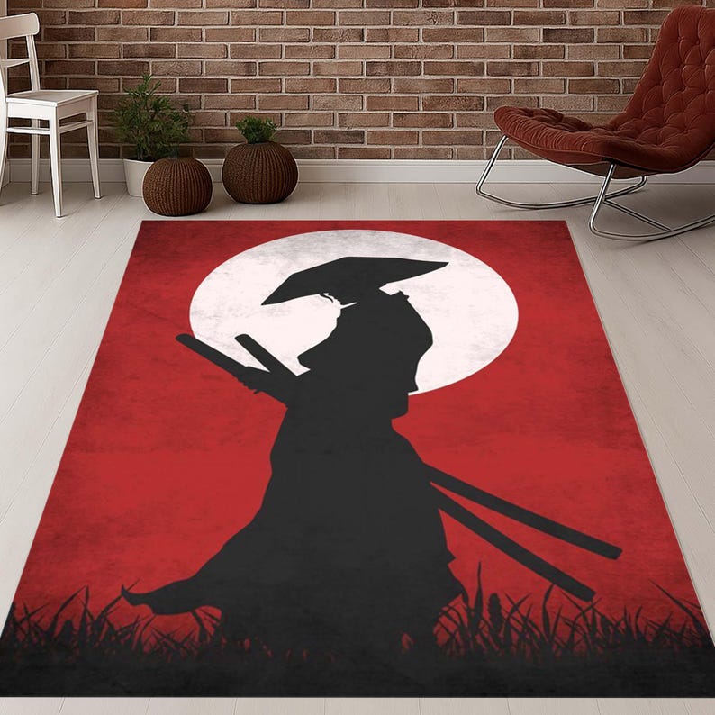 May include: A rectangular rug with a black samurai warrior silhouette set against a red background and a large white moon. The design includes stylized grass at the bottom. Suitable for a living room or bedroom.