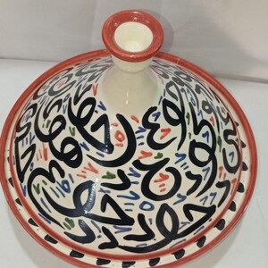 Cook healthy, delicious meals with ease using our artisan ceramic tagine—ideal for slow-cooking meats, veggies, and stews.From stovetop to table, our ceramic tagine offers versatile cooking with an artistic flair. Perfect for Moroccan-inspired meals.