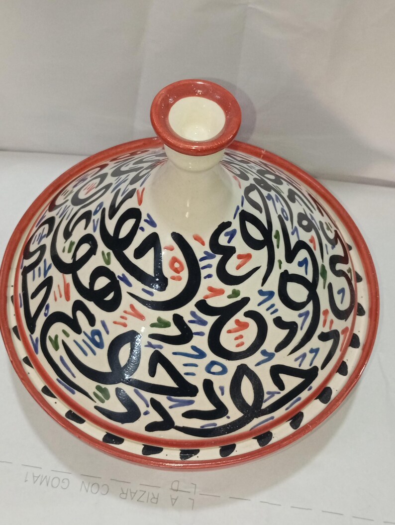 Cook healthy, delicious meals with ease using our artisan ceramic tagine—ideal for slow-cooking meats, veggies, and stews.From stovetop to table, our ceramic tagine offers versatile cooking with an artistic flair. Perfect for Moroccan-inspired meals.