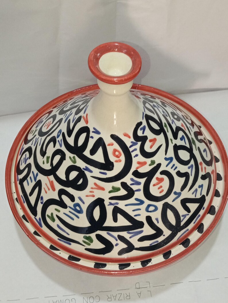 Add Moroccan charm to your home with our hand-painted ceramic tagine, perfect as a centerpiece or serving dish. Transform your table with the vibrant artistry of our decorative ceramic tagines, handmade to inspire conversation.