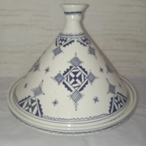 Meticulously crafted from high-quality clay, each tajine is a unique work of art that transforms ordinary ingredients into extraordinary dishes, serving as both a functional kitchen tool and an exquisite piece of cultural decor
