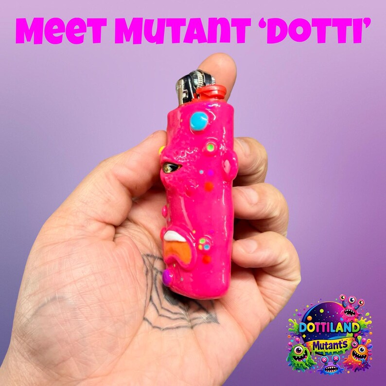 May include: A vibrant pink lighter with a quirky face design, a red top, and colourful details. The text "Meet Mutant 'Dotti'" is above the lighter. A colourful "Dottiland Mutants" logo is in the bottom right corner.
