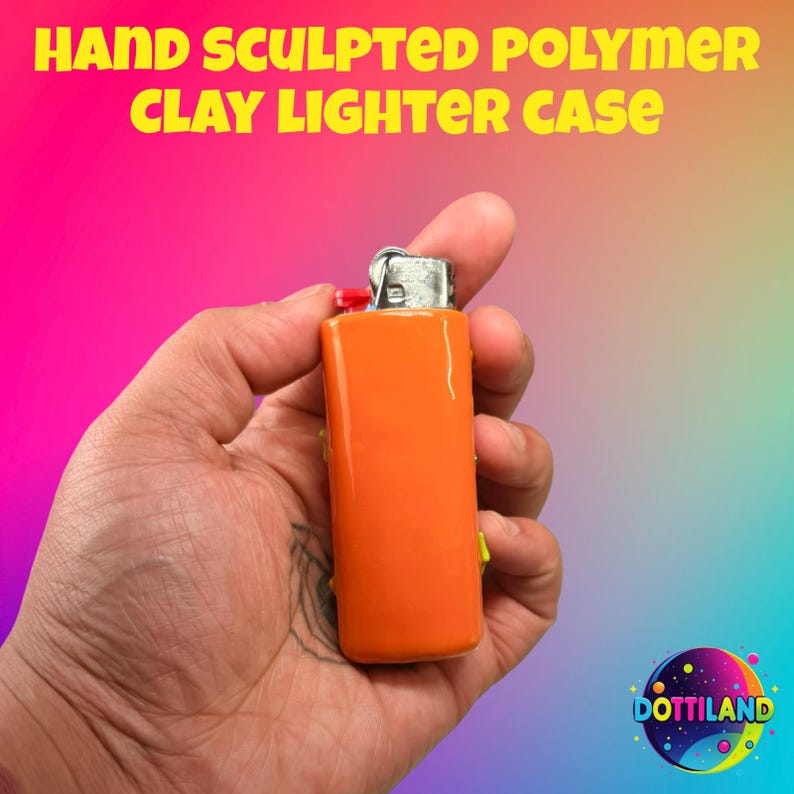 May include: Hand-sculpted polymer clay lighter case in bright orange. The lighter case has a glossy finish and a silver metal top. The text "HAND SCULPTED POLYMER CLAY LIGHTER CASE" is displayed in yellow. The lighter is held in a hand.