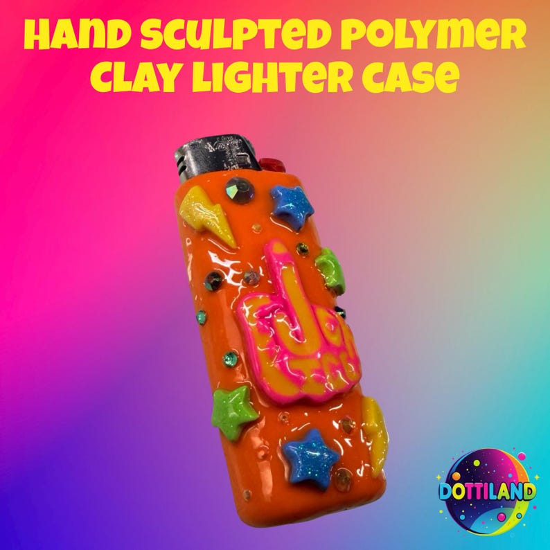 May include: Hand-sculpted polymer clay lighter case in orange, adorned with colorful stars, gems, and a hand gesture. The text "HAND SCULPTED POLYMER CLAY LIGHTER CASE" is displayed in yellow. The lighter case is a unique accessory.