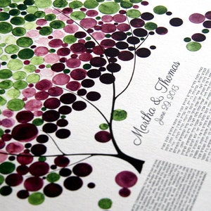 May include: A watercolor painting of a tree with green and purple circles. The tree is on a white background with the text "Martha & Thomas June 29, 2013" written in black cursive.