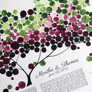 May include: A watercolor painting of a tree with green and purple leaves. The tree is a symbol of love and growth. The text "Martha & Thomas June 29, 2013" is written below the tree.