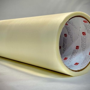 May include: A roll of clear packing tape with a white core and the text "Clear Choice" printed on the core.
