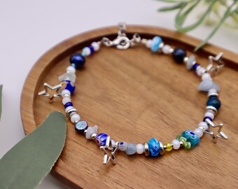 Blue and silver stars charm anklet with black pearls