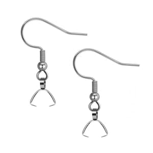 May include: Two silver earring hooks with a small ball and a loop at the bottom. The hooks are made of metal and are designed for attaching earrings.