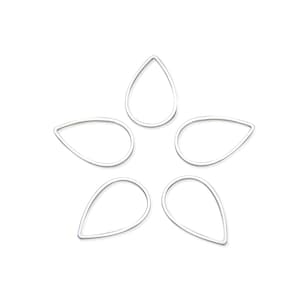 May include: Six silver teardrop-shaped metal rings, arranged in a star shape.
