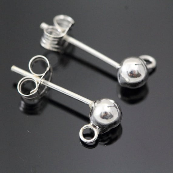 Silver earring posts store and backs