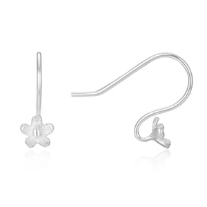 May include: A pair of silver flower-shaped earring hooks. The hooks are made of metal and have a simple design.