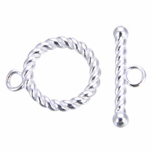 May include: Silver-toned toggle clasp with a twisted rope design. The clasp has a round ring on one end and a bar with a small ring on the other end.