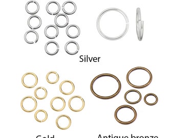 May include: Assortment of jump rings in silver, gold, and antique bronze finishes. The rings are various sizes and are ideal for jewelry making.