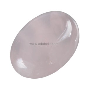 May include: A smooth, oval-shaped, light pink rose quartz crystal.