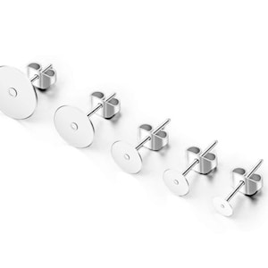 May include: Five silver earring blanks of different sizes. The earring blanks are round and have a post with a butterfly backing.