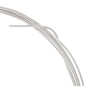 May include: A roll of silver wire, perfect for jewelry making or crafting projects.