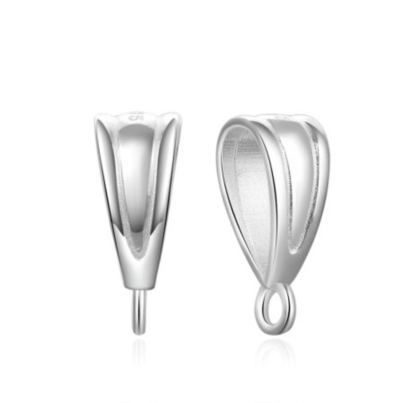 May include: Two silver pendant bails with a loop at the bottom. One bail has a pointed end, the other has a rounded end.