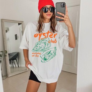 a woman taking a selfie in a mirror