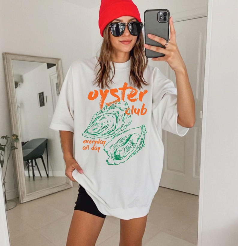 a woman taking a selfie in a mirror