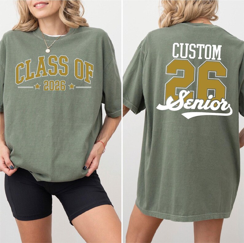a woman wearing a green t-shirt with text and numbers printed on it.
