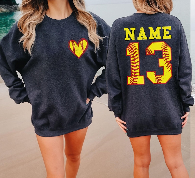 a couple of women standing next to each other on a beach