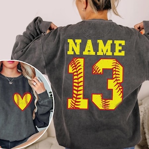 a woman wearing a sweatshirt with the number 13 on it