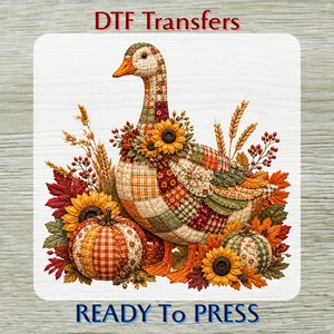 May include: A DTF transfer featuring a patchwork goose surrounded by sunflowers, pumpkins, wheat stalks, and autumn leaves. The text DTF Transfers appears at the top, and READY TO PRESS is printed at the bottom. The design uses warm fall colors.