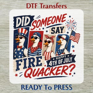 May include: A DTF transfer sheet featuring four ducks wearing patriotic accessories and sunglasses. The text reads DID SOMEONE SAY FIRE QUACKER? HAPPY 4TH OF JULY. The design includes red, white, and blue colors, stars, and an American flag.