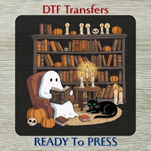 May include: A whimsical illustration featuring a ghost reading a book in a cozy armchair, with a black cat, pumpkins, and a bookshelf filled with books. The image includes the text "DTF Transfers" and "READY TO PRESS".
