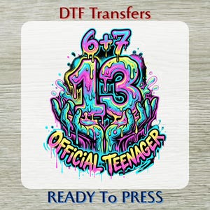 May include: A colorful DTF transfer design with the text "DTF Transfers" at the top and "READY To PRESS" at the bottom. The central graphic features the number "13" in a dripping, multi-colored style, with "6+7" above it and "OFFICIAL TEENAGER" below, all held by stylized hands.