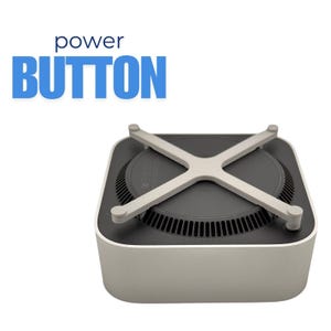 Könnte beinhalten: Ein quadratisches, hellgraues Gerät mit einem dunkelgrauen Oberteil und einer silbernen kreuzförmigen Struktur. Der Text "power BUTTON" wird in Blau über dem Gerät angezeigt. Das Gerät hat ein modernes, minimalistisches Design.