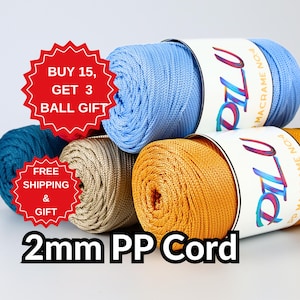 May include: Four balls of 2mm polypropylene cord in blue, beige, yellow, and teal. The balls are labeled "PILU" and "PP MACRAME NO.4". The image also includes a red starburst with the text "BUY 15, GET 3 BALL GIFT" and a red starburst with the text "FREE SHIPPING & GIFT".