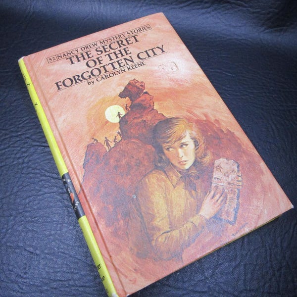 EL SECRETO DE LA CIUDAD OLVIDADA, Historias de misterio de Nancy Drew #52 Carolyn Keene de 1972