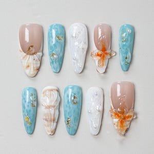 Light Blue Press-On Nails: 3D Pearl Floral Shell Art - Customizable