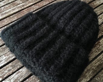 Handmade thick crochet black winter hat made of wool and silk.