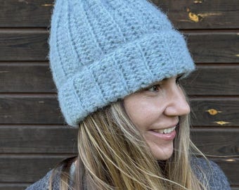 Handmade thick crochet grey-blue winter hat made of wool and silk.