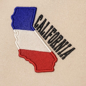 May include: Embroidered patch showing the shape of California in red, white, and blue, with the word "CALIFORNIA" in black. The patch is sewn onto a beige fabric.