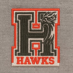 May include: Embroidered patch featuring a stylized black and white hawk head within a large letter "H". The letter and hawk are outlined in orange and white, with the word "HAWKS" below. The patch is on a gray fabric background.