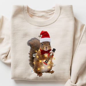 Christmas Squirrel Lights Candy Cane Sweatshirt, Cozy Holiday Elf Forest Animal Sweater, Winter Festive Lights Hoodie, Xmas Season Sweat