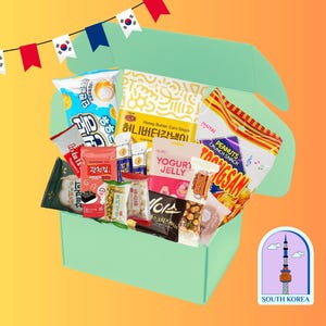May include: A light green cardboard box filled with various South Korean snack packages, including Honey Butter Corn Snack, Yogurt Jelly, and Peanuts Crunch Snack. A string of small South Korean flag pennants hangs above the box, and a South Korea tower sticker is placed in the bottom right corner.