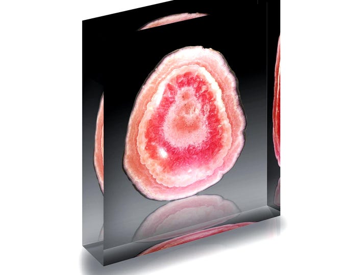 Print of  Rhodochrosite from Argentina displayed in acrylic block.