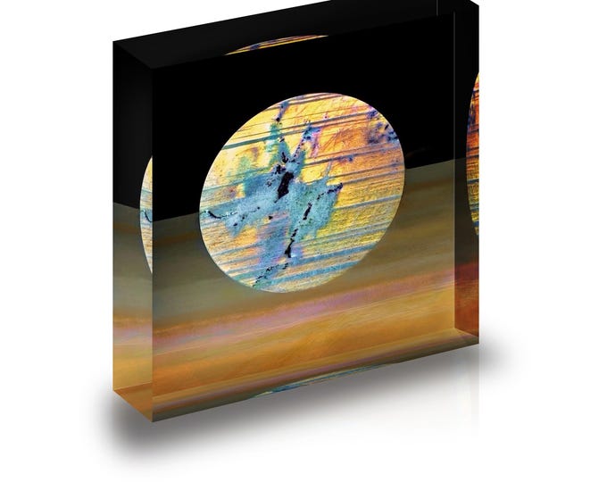 Print of  Purple Labradorite Cabochon from Madagascar displayed in acrylic block.