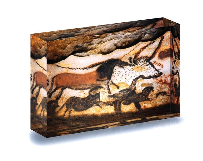 Print featuring prehistoric painting from Lascaux Cave displayed in acrylic block