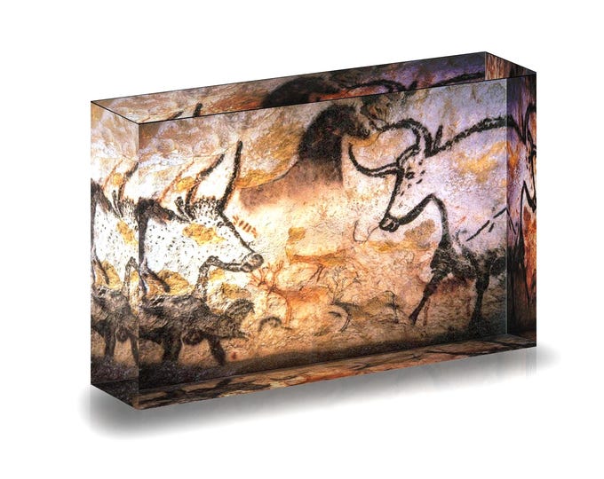 Print of Prehistoric Lascaux cave paintings, France, displayed in acrylic block.