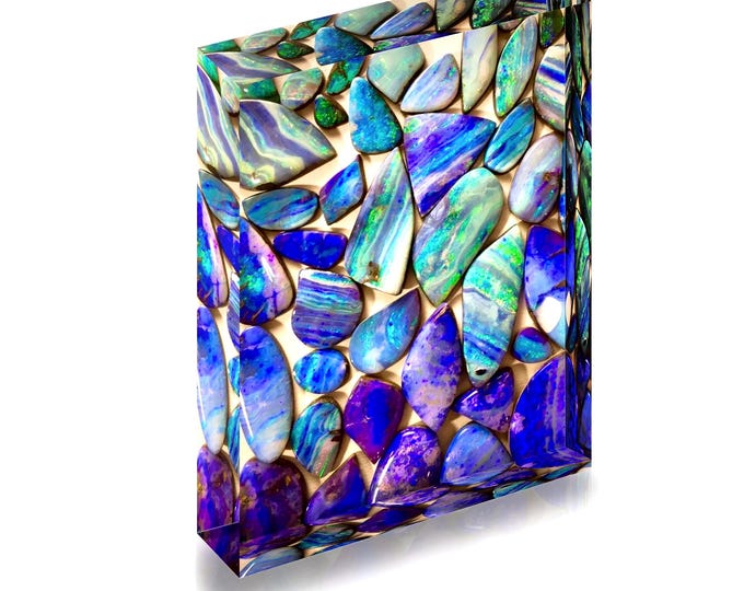 Boulder Opal turned into print for display in acrylic block.
