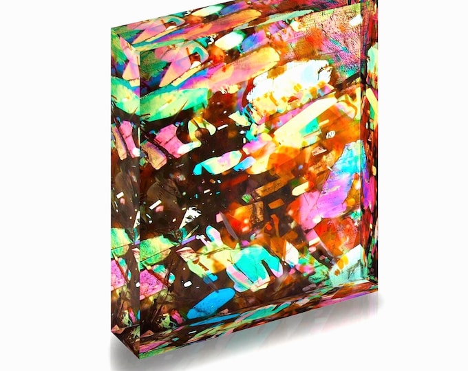 Print of Tanzanian Sunstone displayed in acrylic block.