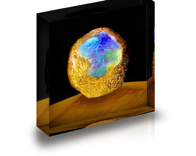 Print of artist rendition of Australian Koroit Opal displayed in acrylic block.