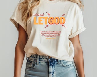 May include: A white t-shirt with the text "Let Go and LETGOD" in orange and red. The shirt also includes a bible verse from Proverbs 3:5-6.
