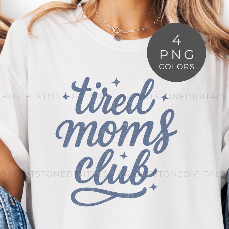 May include: White t-shirt with the text "tired moms club" in a blue script font. The design includes small star accents. A circular graphic in the upper right corner indicates 4 PNG color options.